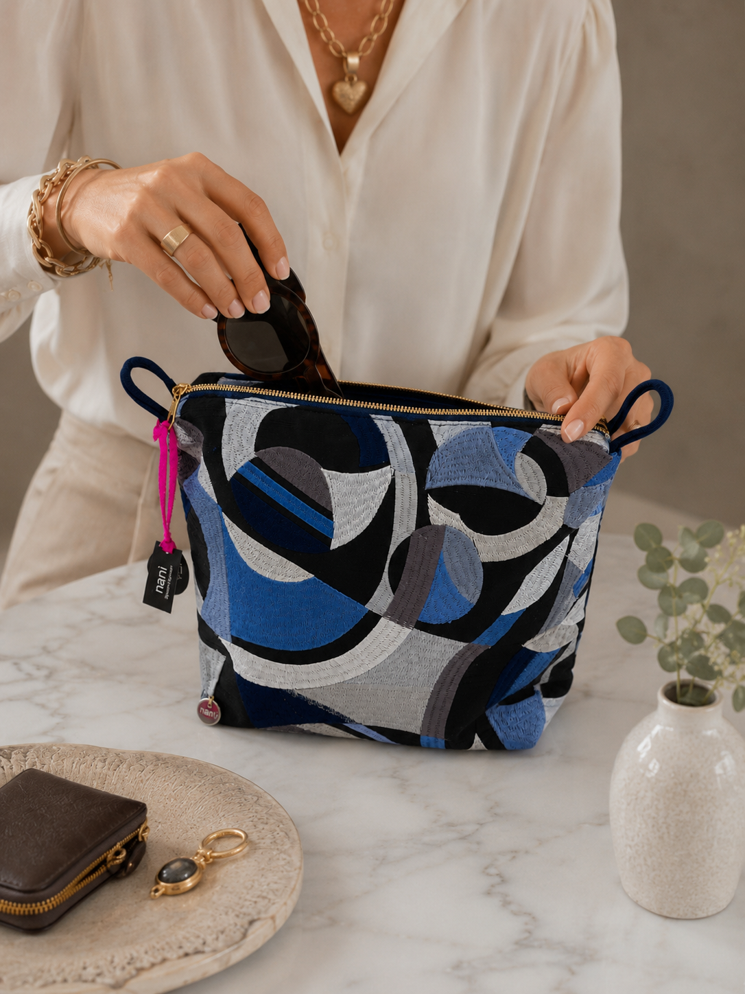 Grande Orbit Trousse da donna in raso